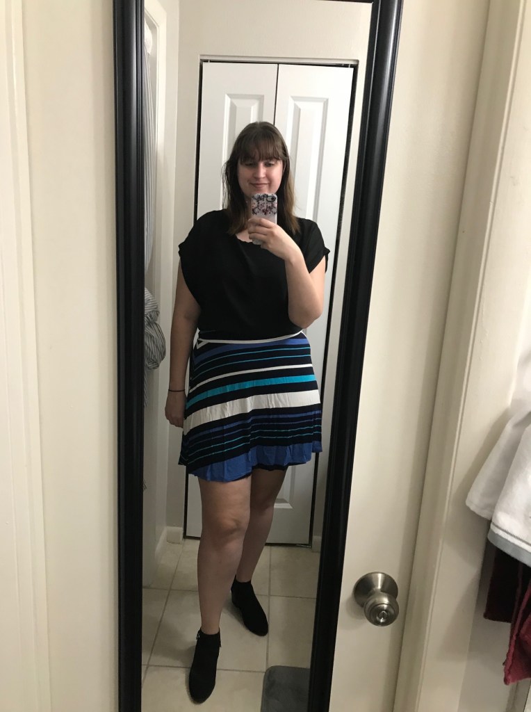 Selfie taken in a mirror of my first day of school outfit.